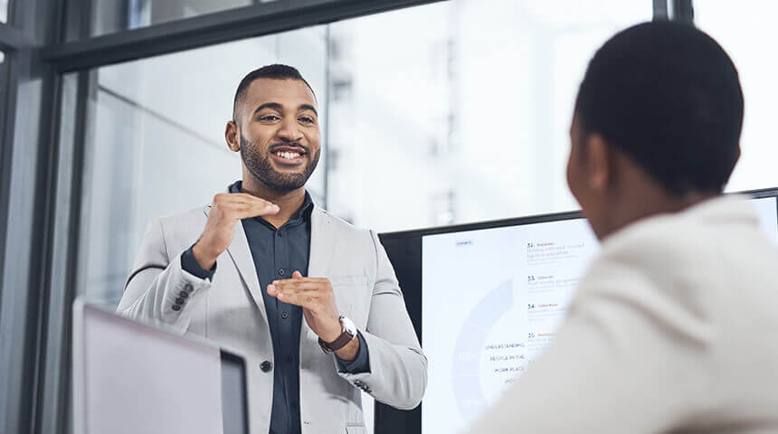 Businessman showing time to elevate