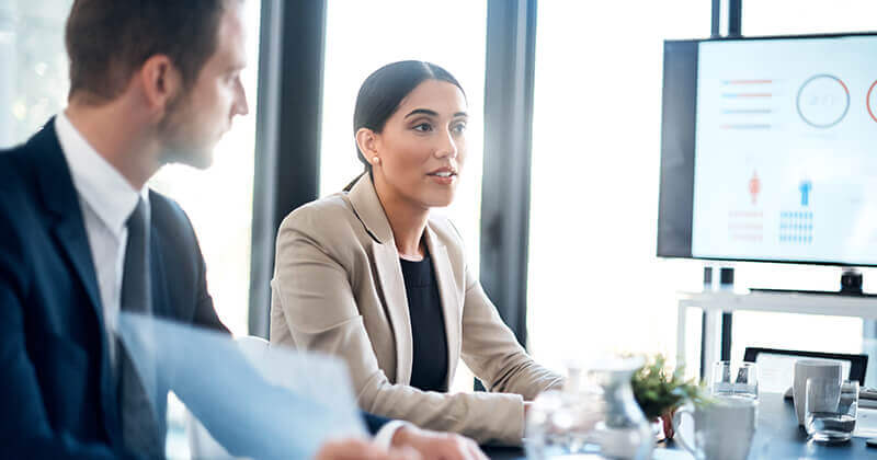 Meeting with clients in boardroom