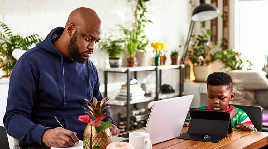 Multi tasking father working from home