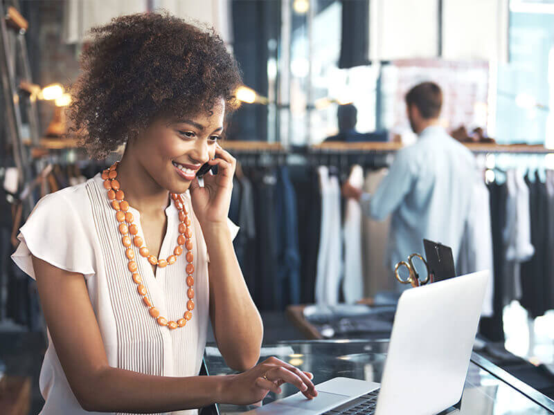 retailer working on the phone